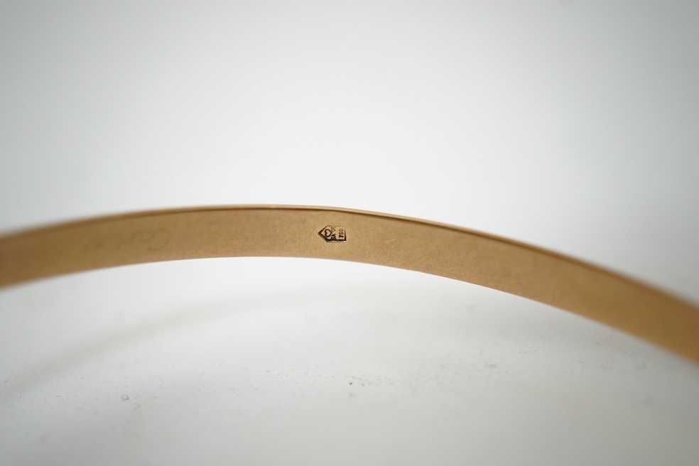 Cartier, a gold bangle, 'Trinity de Cartier'